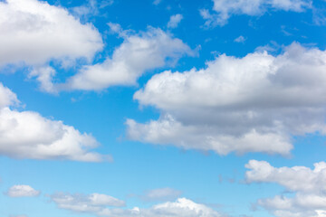 White clouds against a blue sky