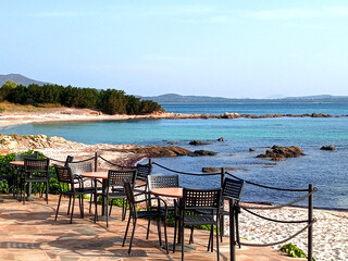 Beautiful beach in Sardinia. View of the blue sea.