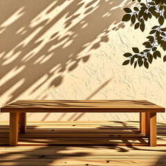 Empty wood table top on beige wall texture with tree leaves shadow background