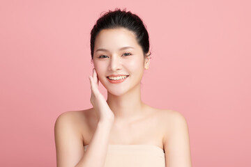 Fototapeta premium Beautiful young asian woman with clean fresh skin on pink background, Face care, Facial treatment, Cosmetology, beauty and spa, Asian women portrait.