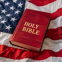 A red Bible is on top of a white American flag
