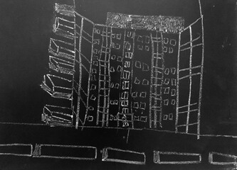 Chalk drawing of building by child on Blackboard - Stock Image