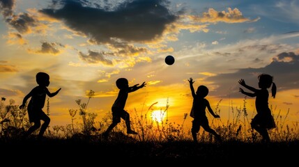 Silhouette of Kids Playing with a Ball at Sunset