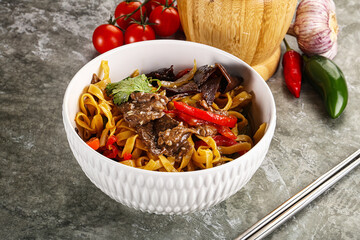 Asian wok with noodle, vegetables and beef