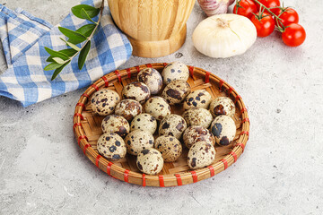 Raw quail eggs in the bowl