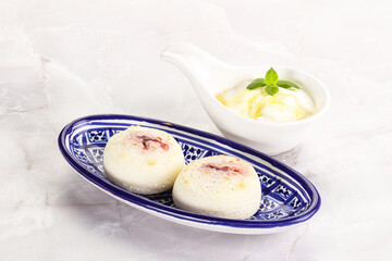 Curd pancakes with sour cream