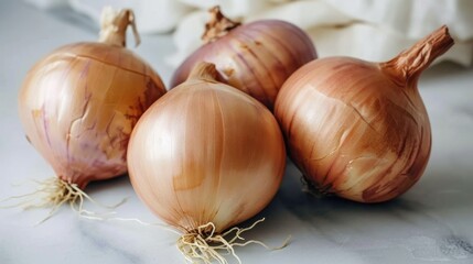 Onion bulbs on a light surface