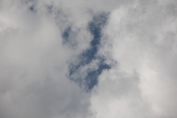 Blue sky. Beautiful Cumulus clouds flying across the sky,