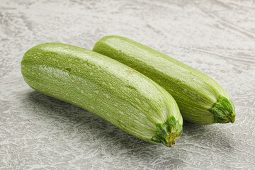 Raw green ripe zucchini vegetable