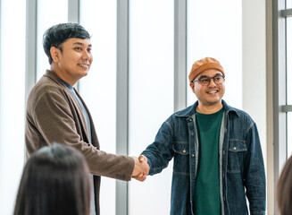 Asian business start up freelance people team analyzing statistics financial. Group Team of businesspeople man and woman Meeting Conference Discussion various topic Corporate Concept in office.