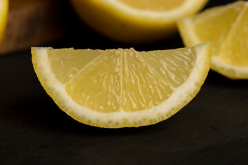 close-up of a table with slices of yellow lemon