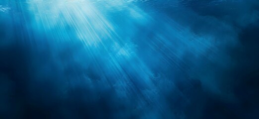 Fototapeta premium A calm blue light background with mystery and bright rays