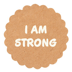 I am strong, motivational text message on round craft paper piece, isolated, self-empowerment and...