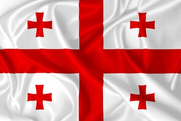 Flag of Georgia waving in the wind on silk texture