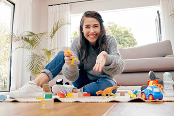 Baby, pov and portrait with woman, toys and playroom for toddler with parent, cheerful and happy....