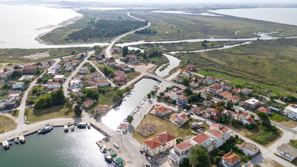 Obraz premium Aerial drone view od Agios Nikolaos Monastery on the Vistonida Lake at Porto Lagos, Greece