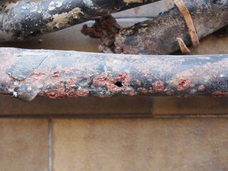 corroded lead pipe