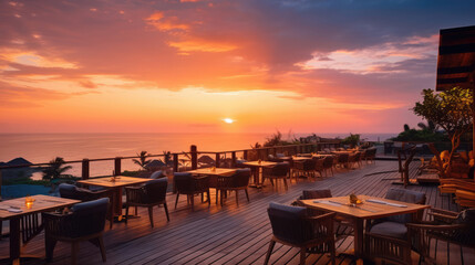 Outdoor restaurant at the beach. Tables at beach restaurant. Led light candles and wooden tables, chairs under beautiful sunset sky, sea view. Luxury hotel or resort restaurant,, generative ai