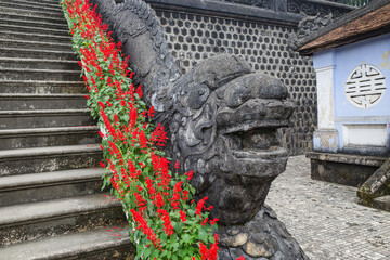 Hue, Vietnam - 6 Feb, 2024: Stone staircase leading to the mausoleum of Emperor Khai Dinh in Hue,...