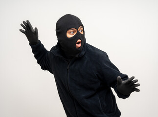 Thief in uniform black jacket various pose on isolated background. The Robber terrorism criminal...