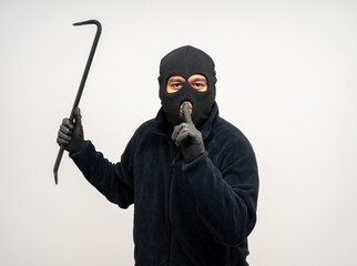 Thief in uniform black jacket various pose on isolated background. The Robber terrorism criminal...