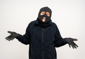 Thief in uniform black jacket various pose on isolated background. The Robber terrorism criminal...