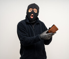Thief in uniform black jacket various pose on isolated background. The Robber terrorism criminal...