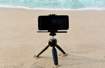 Using a mobile phone camera to take pictures of the sea