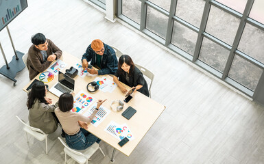 Asian business start up freelance people team analyzing statistics financial. Group Team of businesspeople man and woman Meeting Conference Discussion various topic Corporate Concept in office.