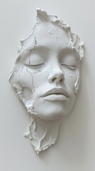 Three-dimensional female face created with thick white paint and flexible paste, on a plain white backdrop. Ideal for modern interior decoration or poster designs