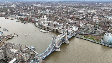 Tower Bridge city centre London UK  Overhead birds eye drone aerial view   over river Thames .