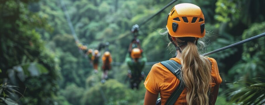 A group of friends embarking on a thrilling ziplining adventure through a lush forest canopy.