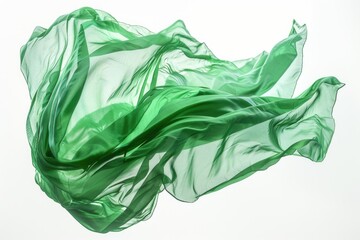 Fototapeta premium A piece of green cloth is suspended in mid-air, appearing to defy gravity