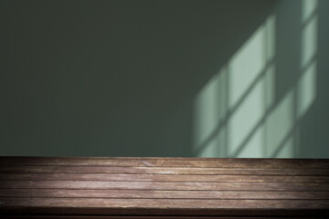 wooden table, wall background with soft window lighting and subtle shadows