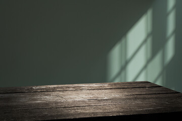 wooden table, wall background with soft window lighting and subtle shadows