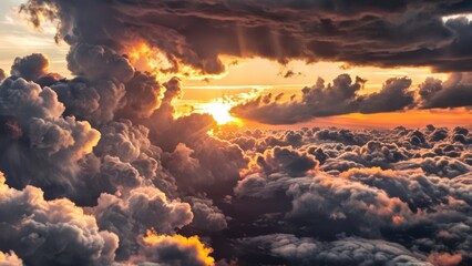 the sun is setting over the clouds in the sky