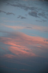 beautiful cloudy sunset creating pink and orange clouds.