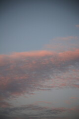 beautiful cloudy sunset creating pink and orange clouds.