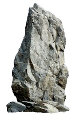 A large rock sits atop a pile of smaller rocks in a natural setting