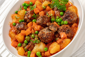 turkish meatball stew, sulu kofte, in a bowl