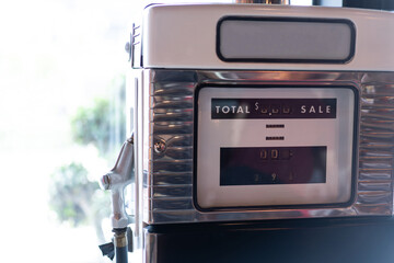 Old vintage gas pump ,Old vintage pumps decorate the coffee shop. ,background natural light in the afternoon