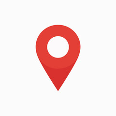 A red location pin icon. The pin is designed with a rounded top, resembling a location marker, and a pointed bottom, indicating direction. It is set against a white background