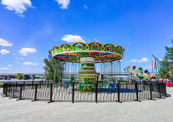 Novosibirsk, Novosibirsk region, Russian Federation - June 01 2024. Children's carousel on...