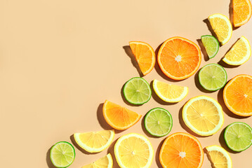 Citrus fruit slices, orange, lemon, lime.