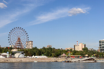 Novosibirsk, Novosibirsk region, Russian Federation - June 01 2024. Ferris wheel on Mikhailovskaya embankment