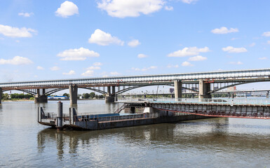 Novosibirsk, Novosibirsk region, Russian Federation - June 01 2024. Novosibirsk metro bridge and Oktyabrsky bridge