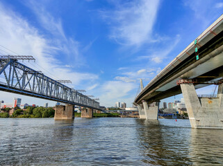 Novosibirsk, Novosibirsk region, Russian Federation - June 01 2024. Novosibirsk metro bridge and Oktyabrsky bridge