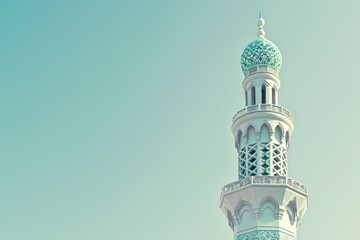 Majestic Minaret with Intricate Design Against a Clear Sky