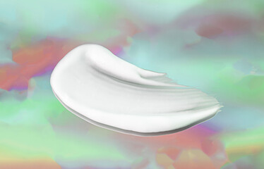 Face or body white cream brush stroke swatch hair balm multi-colored retro style background 