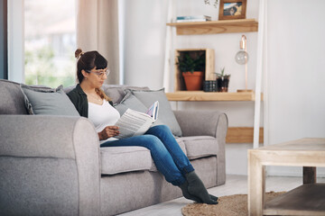 Rest, reading and woman with story on sofa in home on weekend for calm, peace and self help...